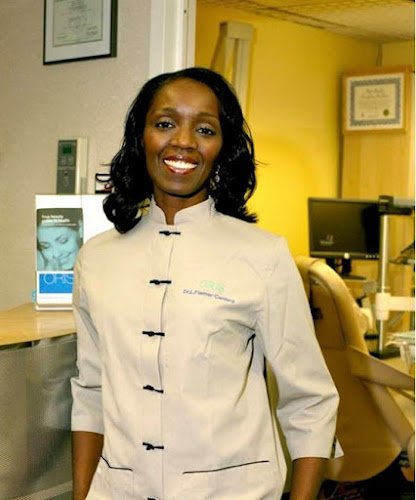 Lorna Flamer-Caldera DDS FAGD FACD