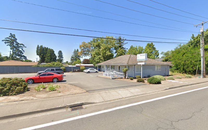 Natural Dentures & Implant Center