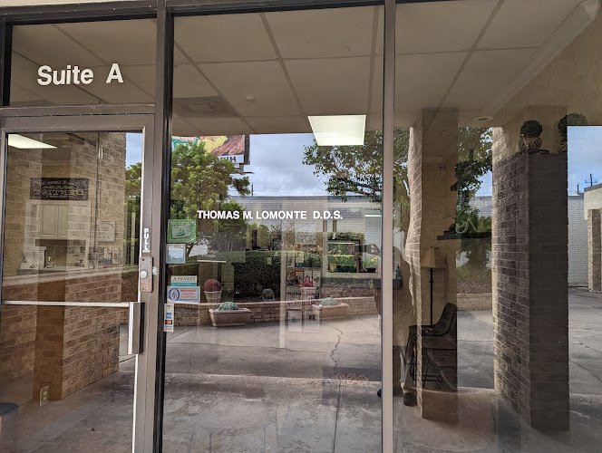 Thomas M. Lomonte DDS